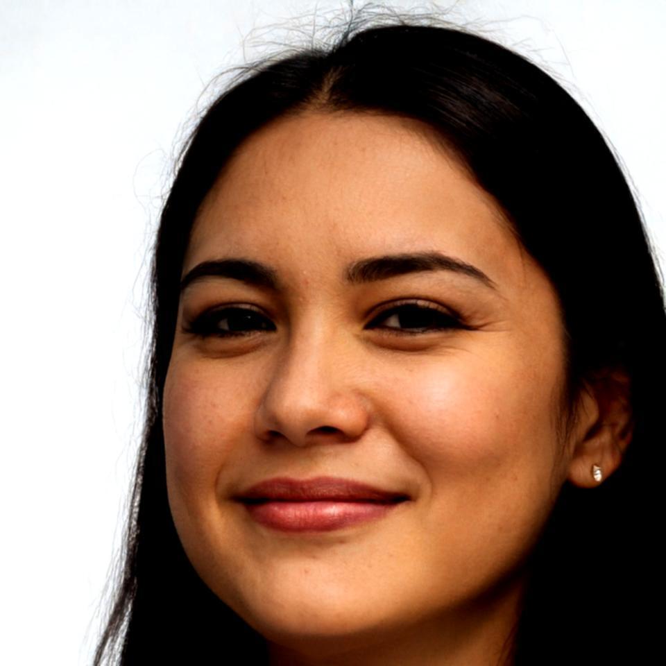 Professional headshot of Dr. Elena Kowalski
